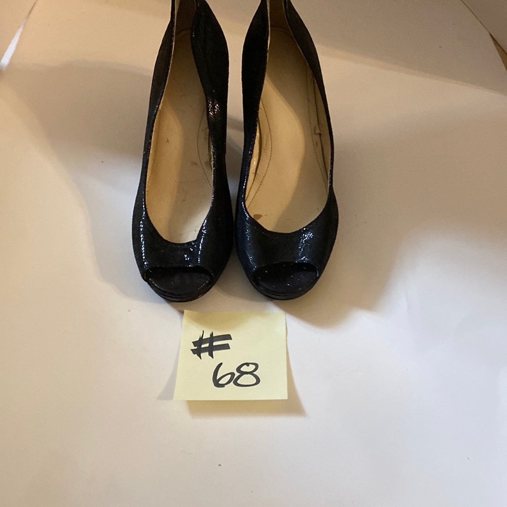 Calvin Klein black snake embossed heel size 8.5. Heel height 3 inches.